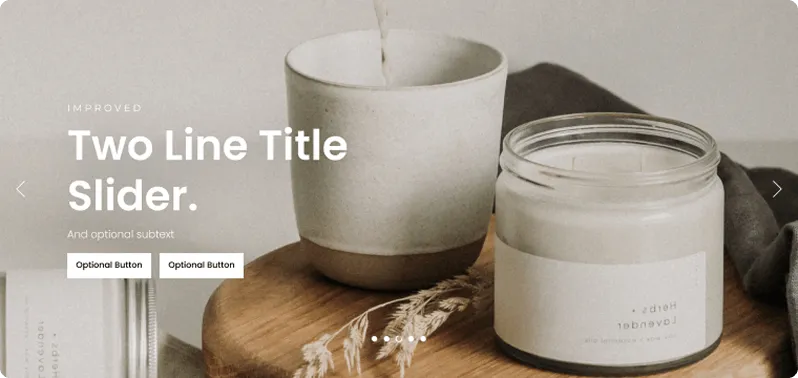 Ceramic cup being filled with liquid and a lit candle jar on a wooden surface with dried grasses nearby.