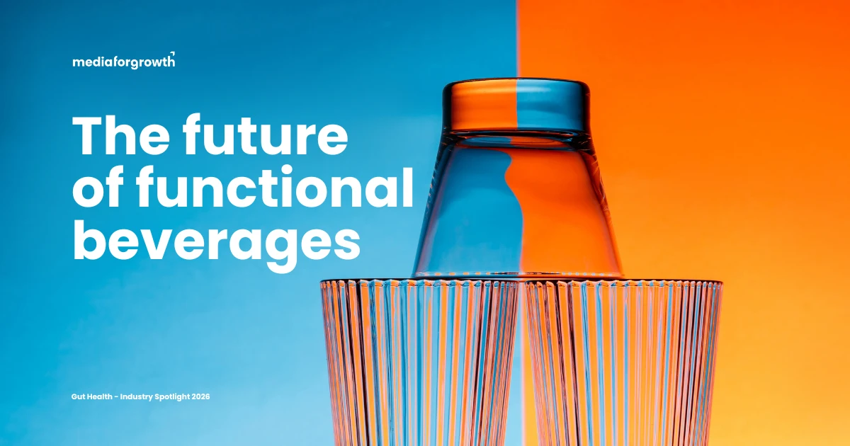 A split blue and orange background with a clear glass bottle and ribbed drinking glass in the foreground. Bold white text reads: 'The future of functional beverages.' The mediaforgrowth logo appears in the top left, with the subtitle 'Gut Health – Industry