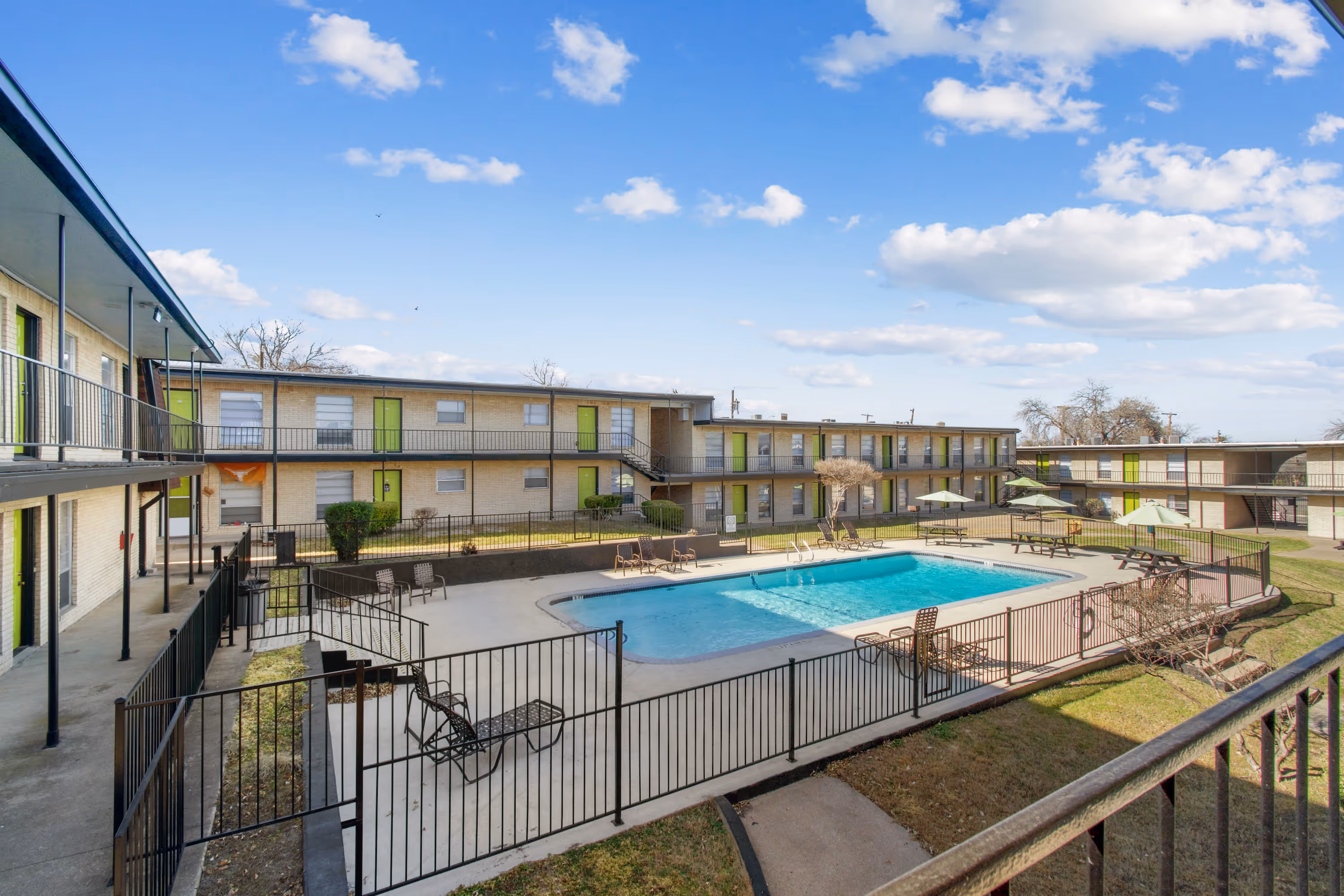 View if pool with lounge chairs