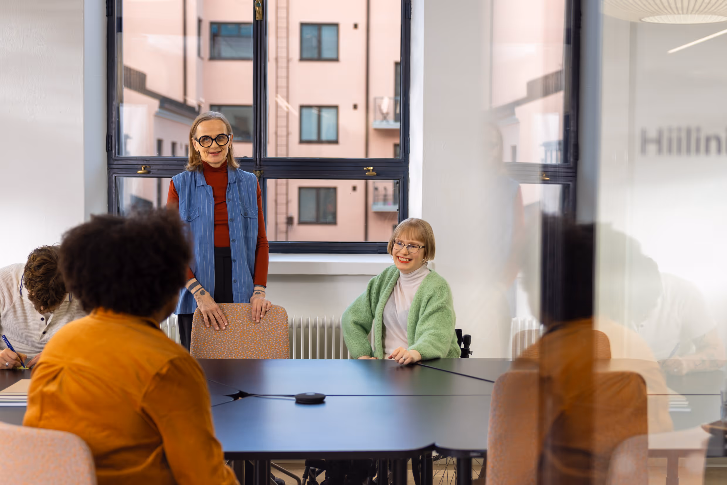 Team training session in a modern office, illustrating Kwizie’s shift to verified assessments and certification.