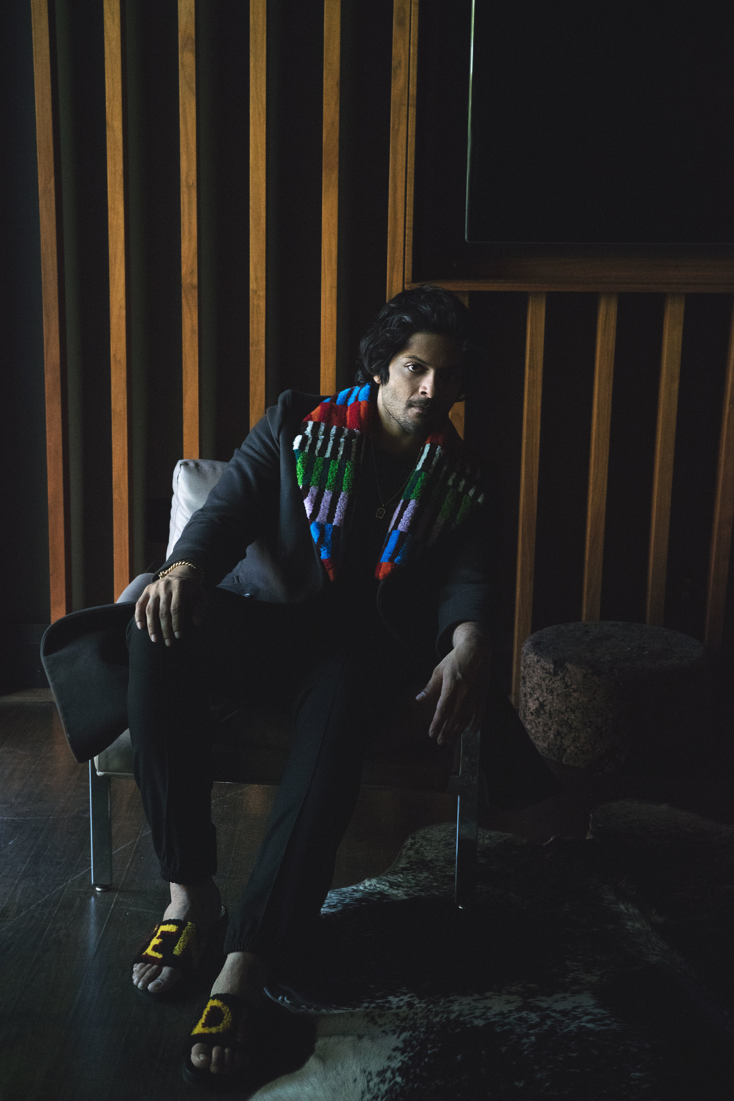 Ali Fazal | all images by Mitchell Nguyen McCormack | Credits: FENDI coat, t-shirt, and shoes, DIOR pants, and REGIME NY necklace