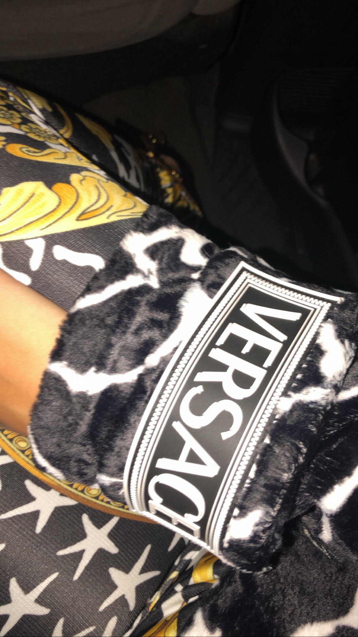 At the @versace show in full VERSACE outfit