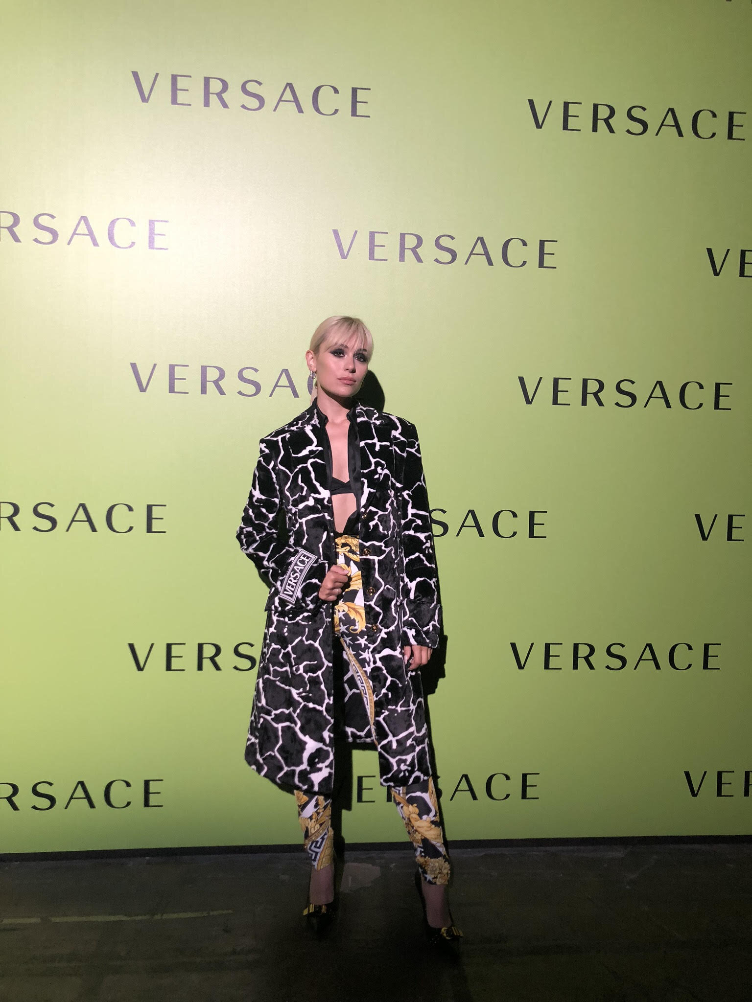At the @versace show in full VERSACE outfit