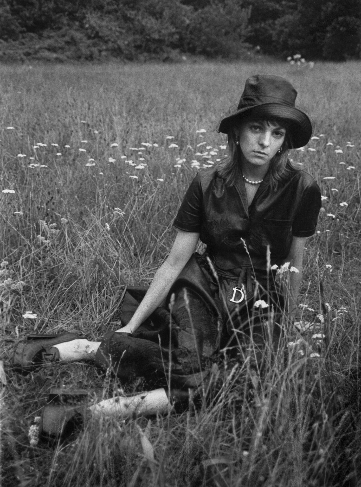 DIOR top, skirt, belt, necklace, earrings, hat and GIVENCHY shoes.