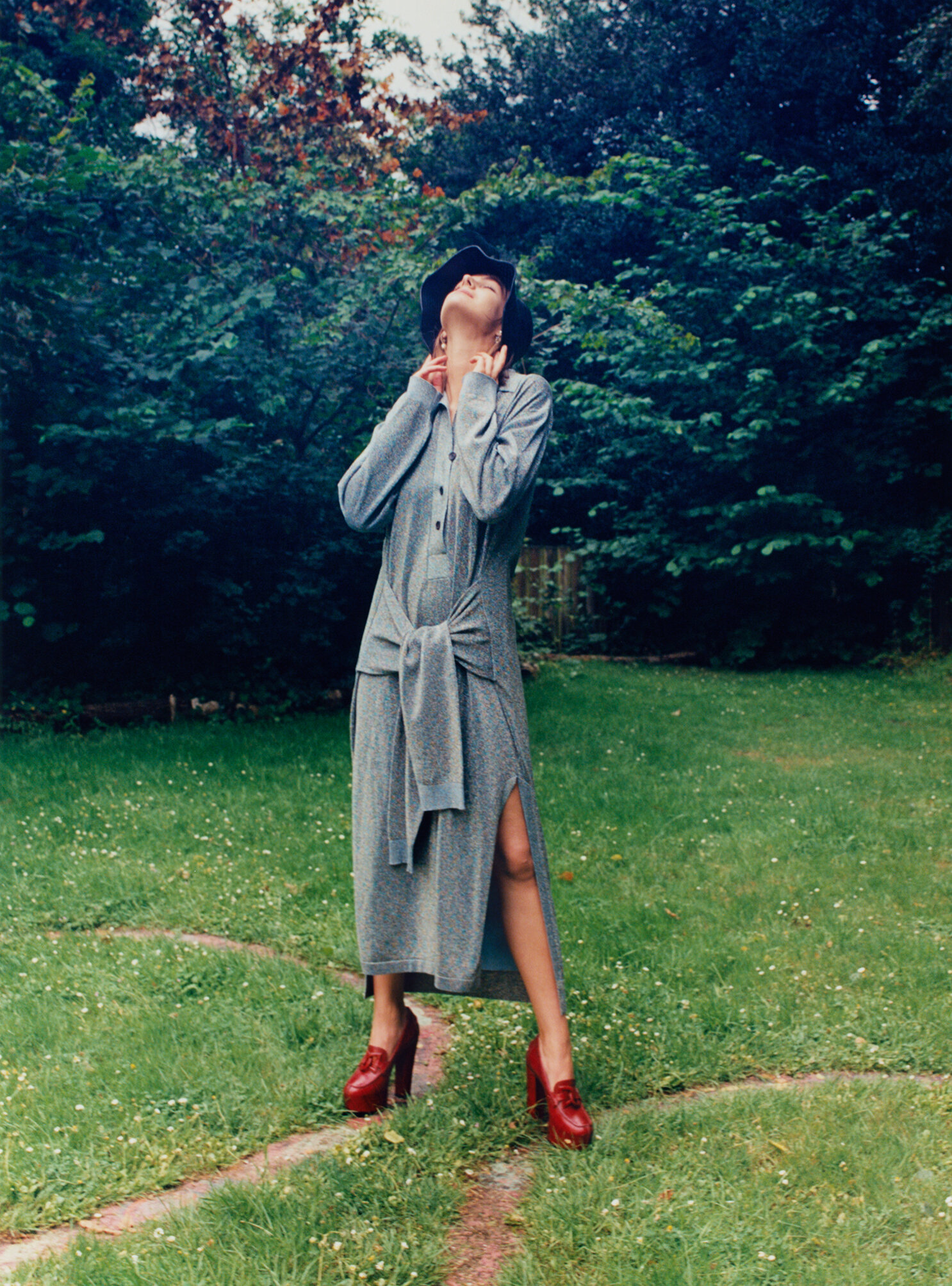 LANVIN dress, GIVENCHY shoes, and DIOR hat and earrings.