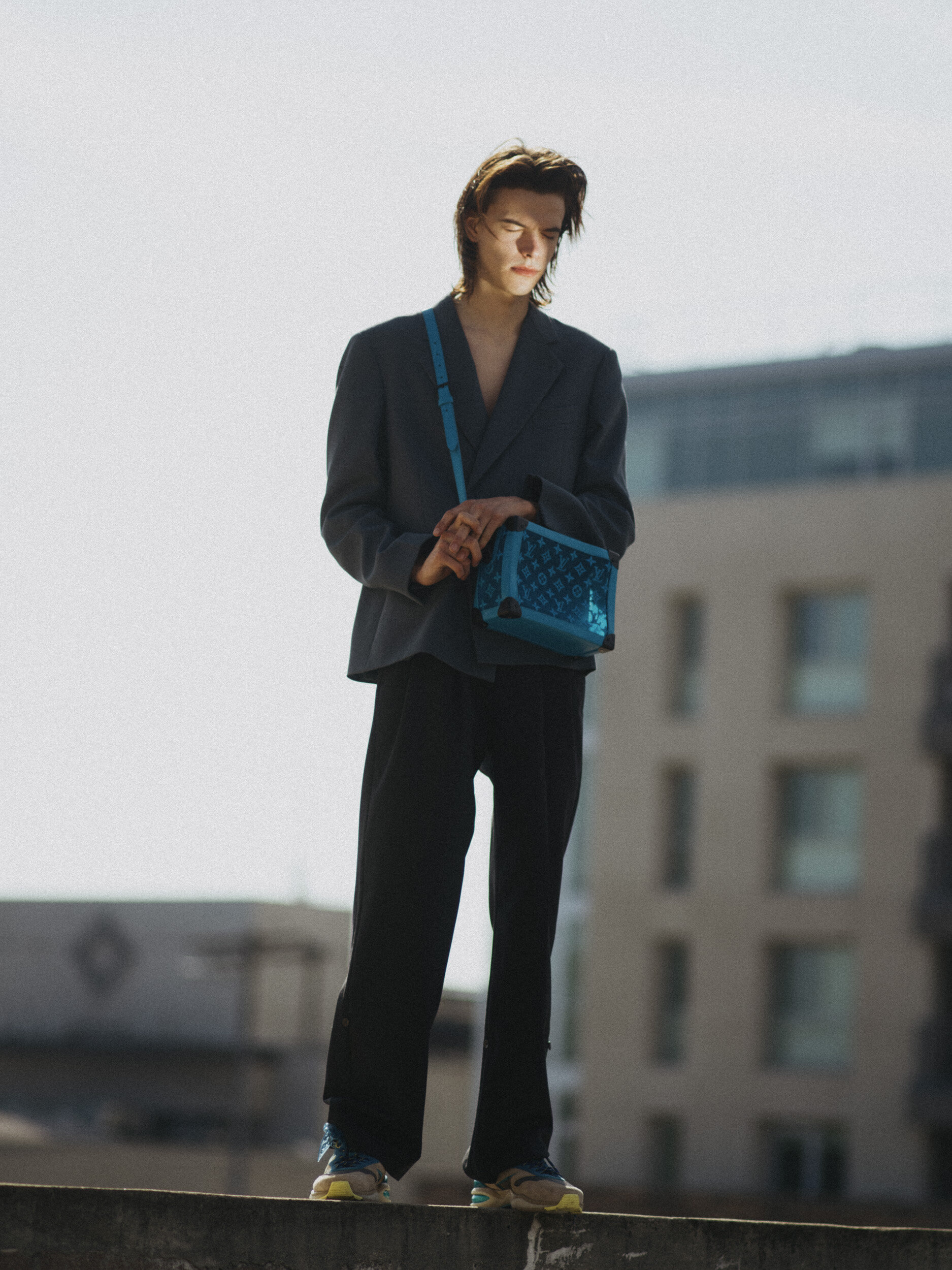 LOUIS VUITTON blazer, pants, bag, and shoes.