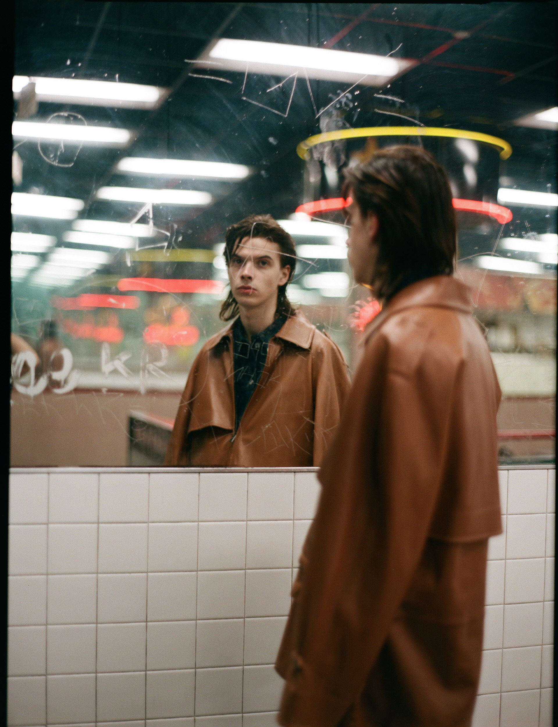 FENDI coat and J. LINDEBERG shirt.