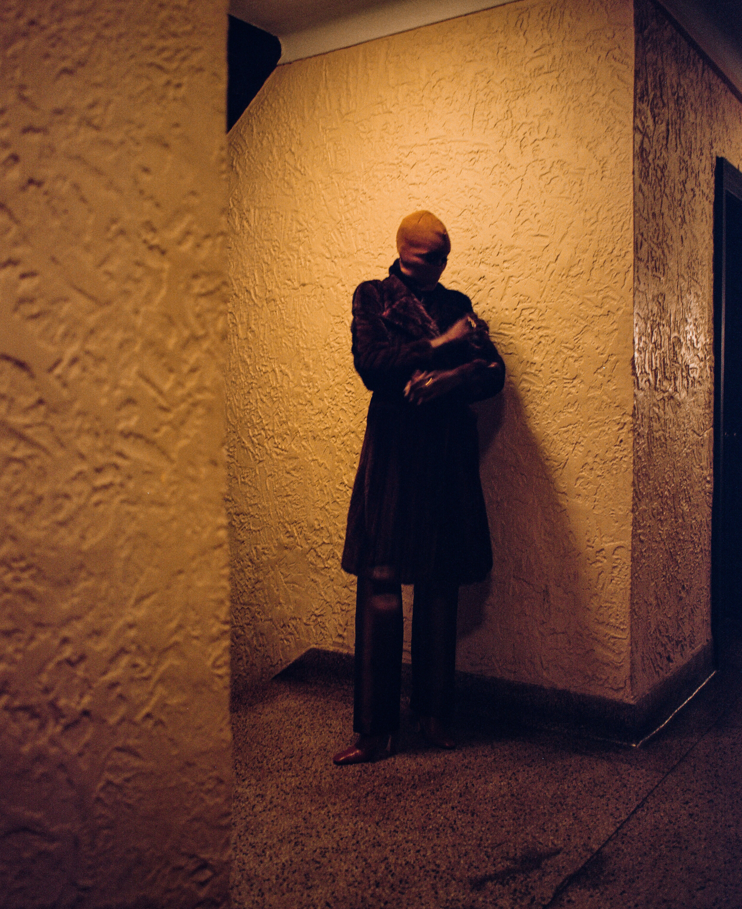 ALIÉTTE coat and pants, BROTHER VELLIES shoes, THIRD CROWN ring, and DSQUARED2 rings, and stylist’s own mask.