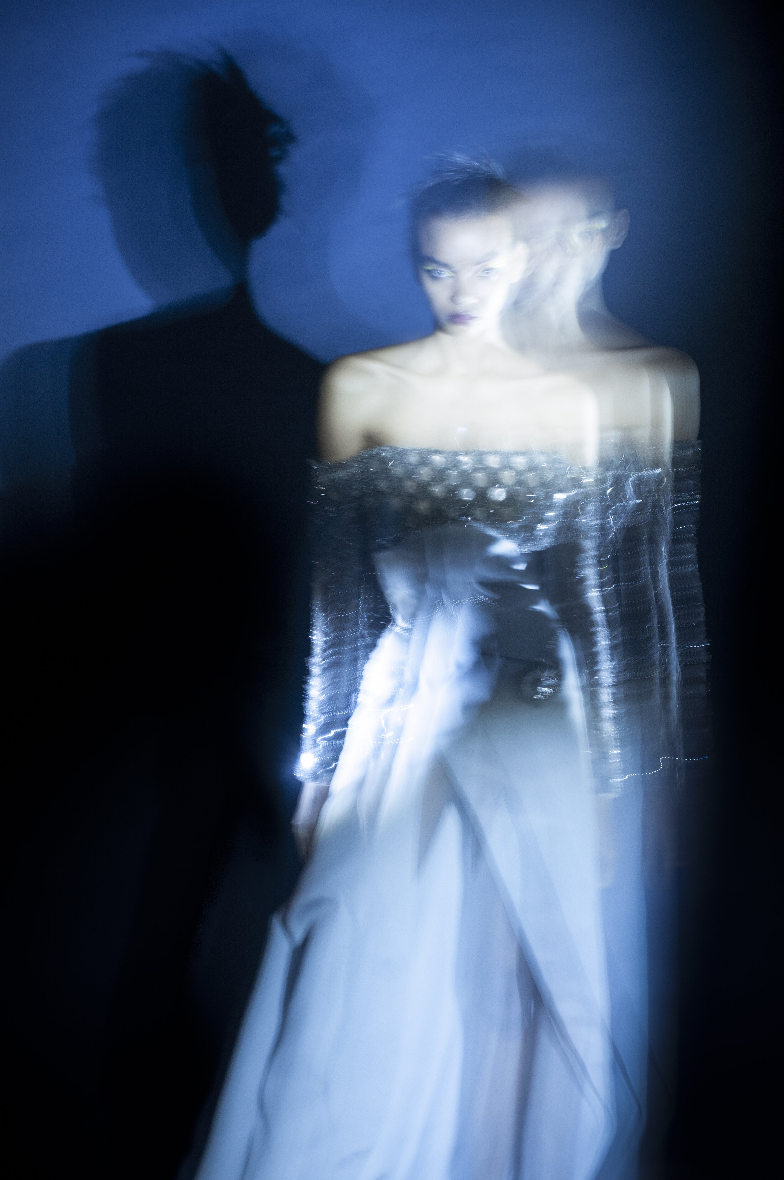 ANTONIO GRIMALDI crêpe dress with glass embroideries details, ELIE TOP necklace worn as a belt, and MARIE BELTRAMI gold disc earring&nbsp;