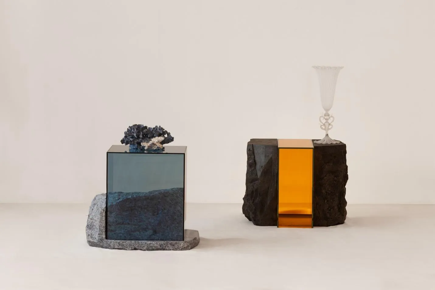 A pair of cubes with a glass on topAI-generated content may be incorrect.