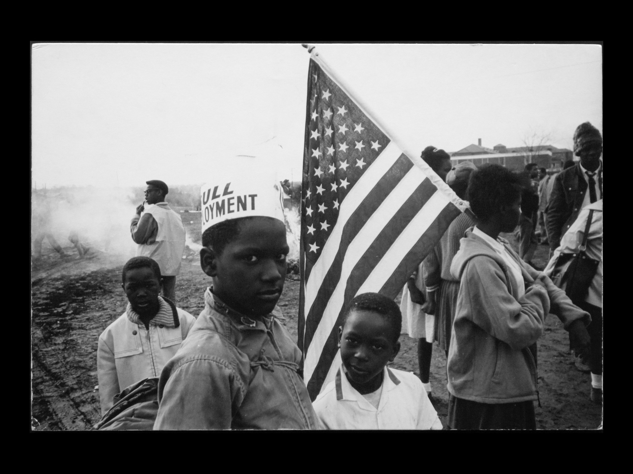 Image Shot by Dennis Hopper | “Selma, Alabama (Full Employment)” (1965) | Gelatin silver print mounted on cardboard | 6 2/5 x 9 4/5 inches | Courtesy of The Hopper Art Trust and Kohn Gallery