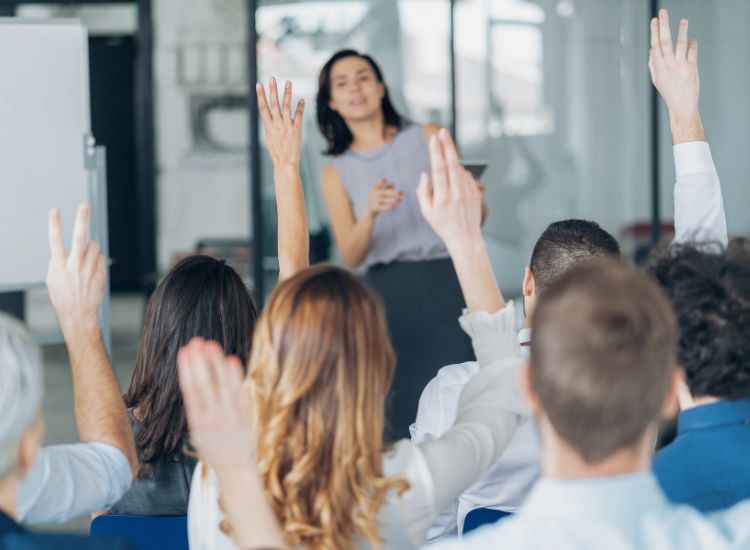 delivering motivational speech and inspiring the audience