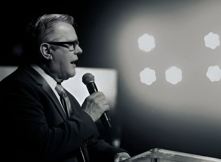 a professional speaker delivering his speech