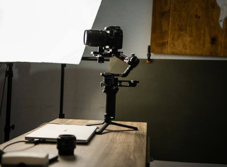 A clean recording setup: with lighting and a camera on a tripod
