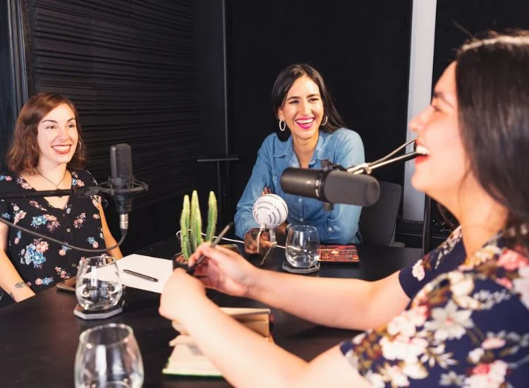 Three women doing a roundtable podcast