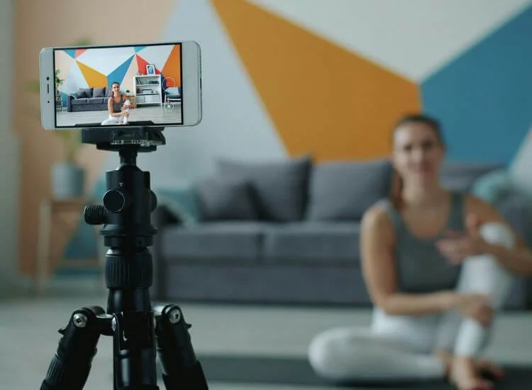 fitness instructor giving tutorial video