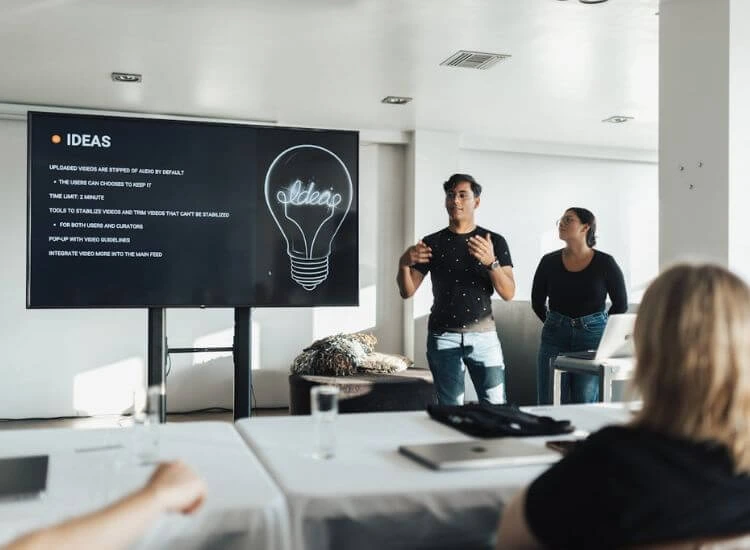 Presenter making eye contact and engaging with the audience.