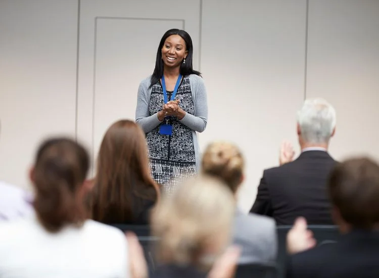 keynote speaker in front of an audience