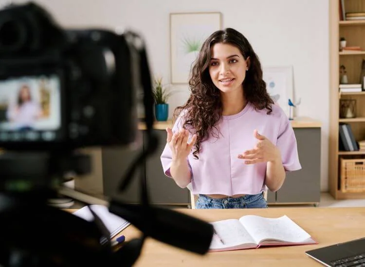 female content creator filming a content