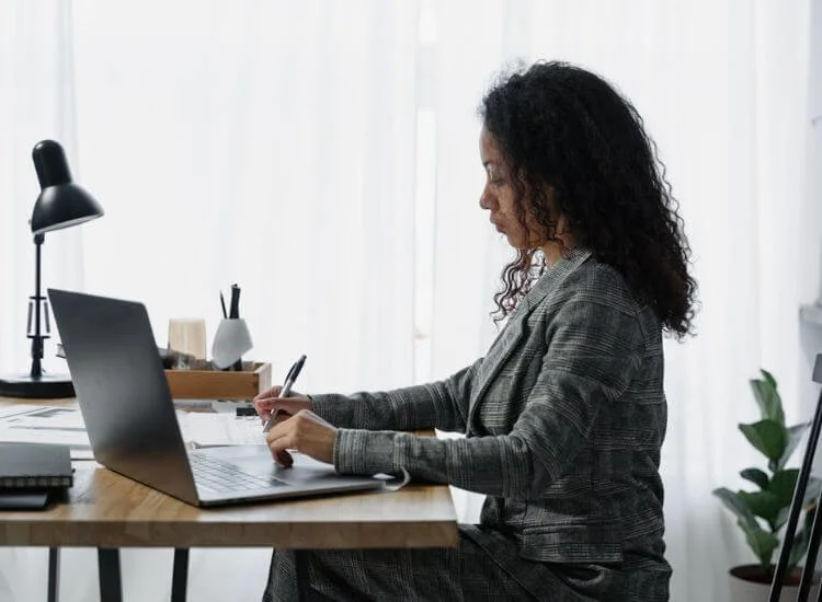 Educator preparing structured lesson content for an online learning video