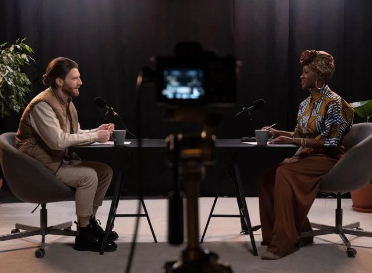 filming a podcast episode with a guest