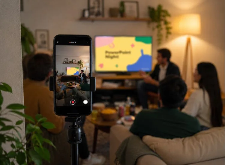 Smartphone on a tripod recording a PowerPoint night for social media content