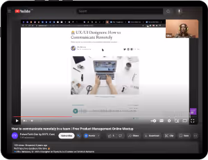 YouTube video titled 'How to communicate remotely in a team' showing a presentation slide about UX/UI remote communication and a speaker wearing green headphones.