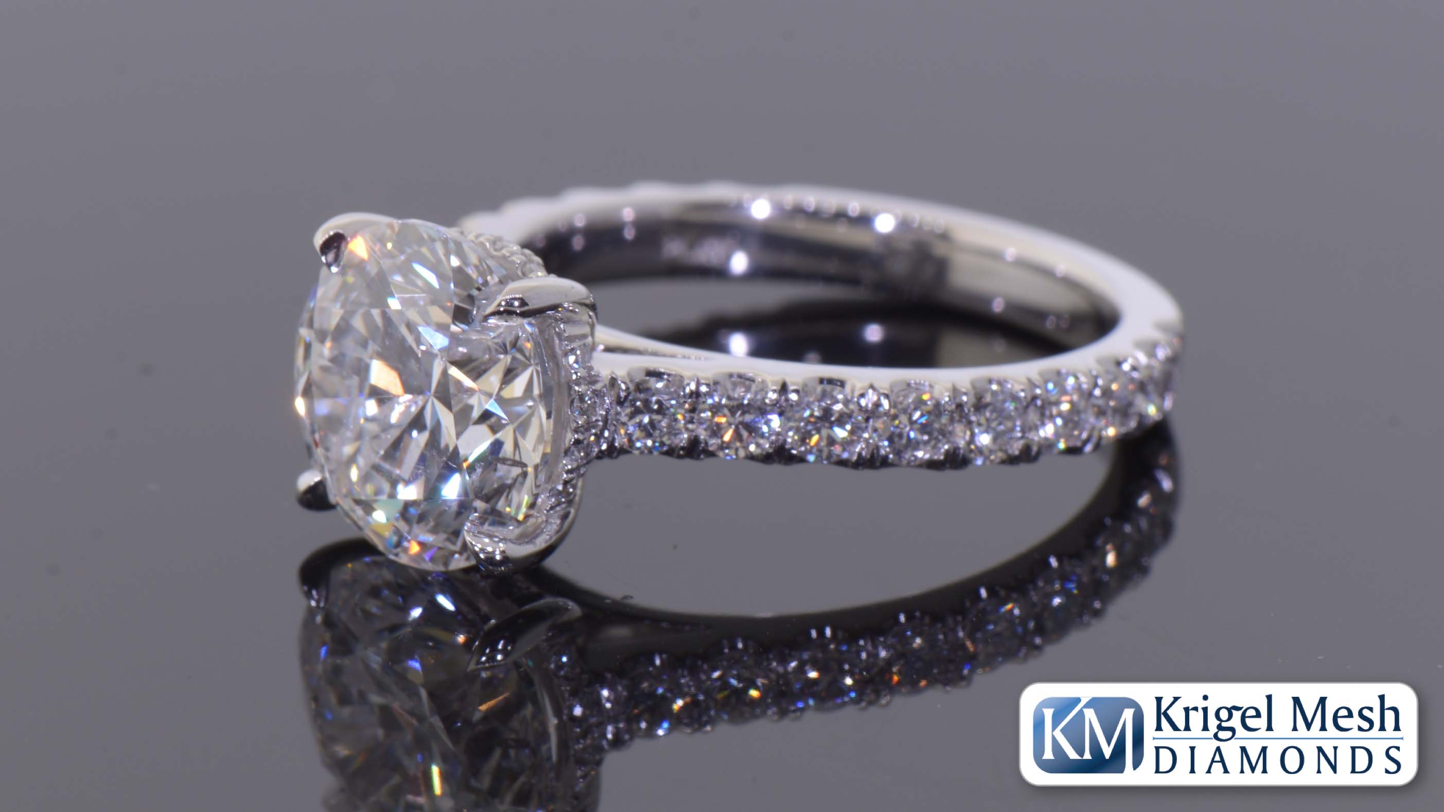 3 carat round in platinum with hidden halo