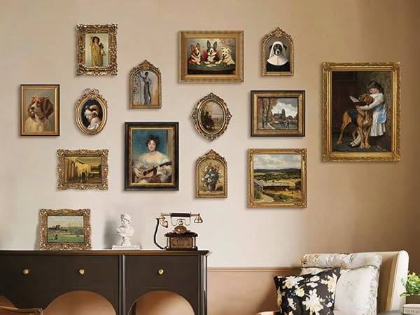 Oil paintings in gilded frames hanging on the wall.