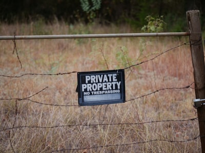 Private property sign on a fence.