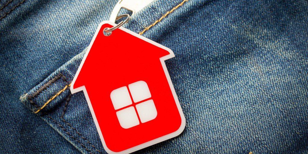 Pocket listing with a red house key.