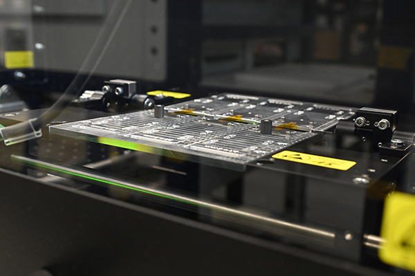 Close up of flexible electronic parts in the bending tester