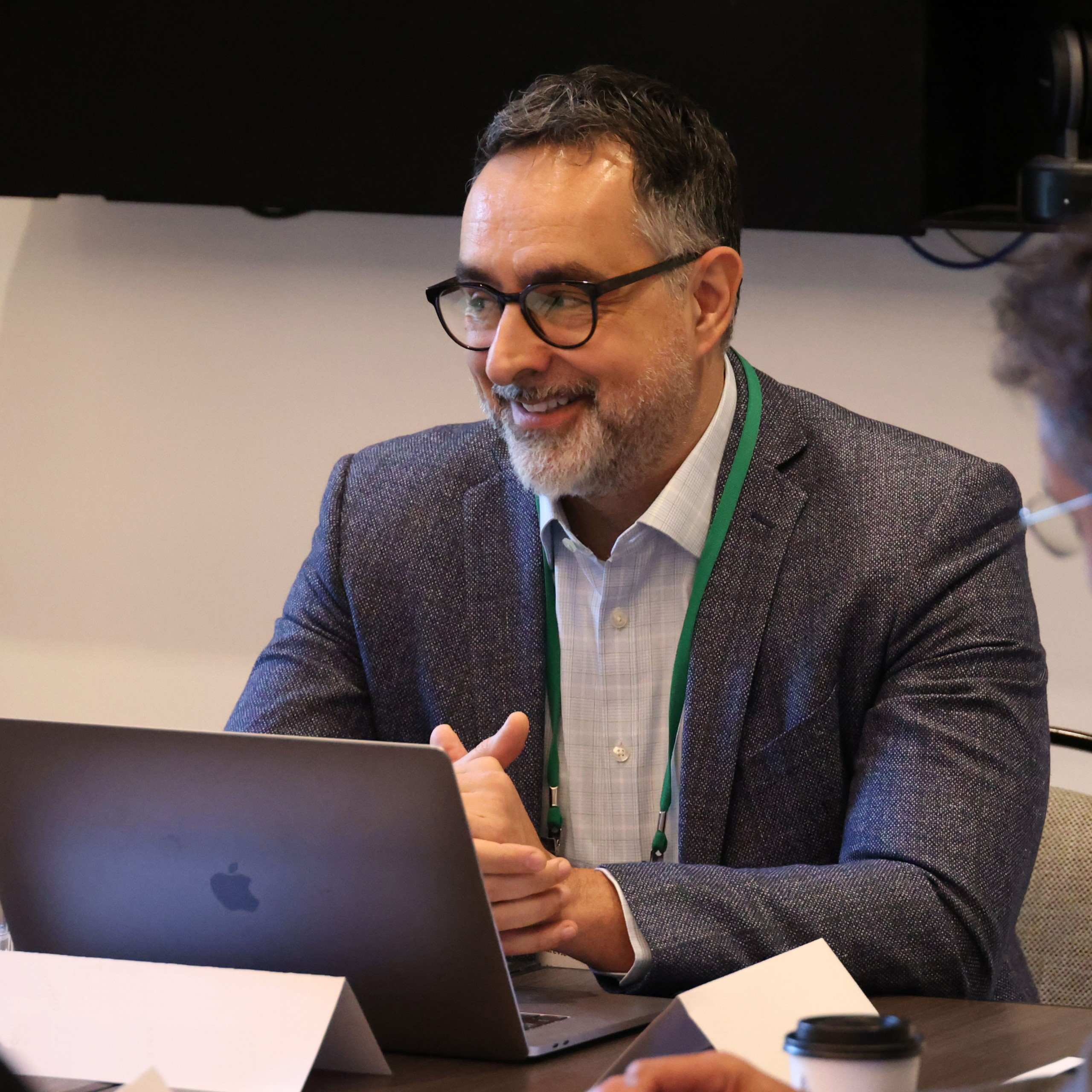 A participant discussing ideas at a Think Tank table
