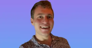 Tyler Kapp, CEO of Butterfly Positronics, in a professional portrait with a gradient background