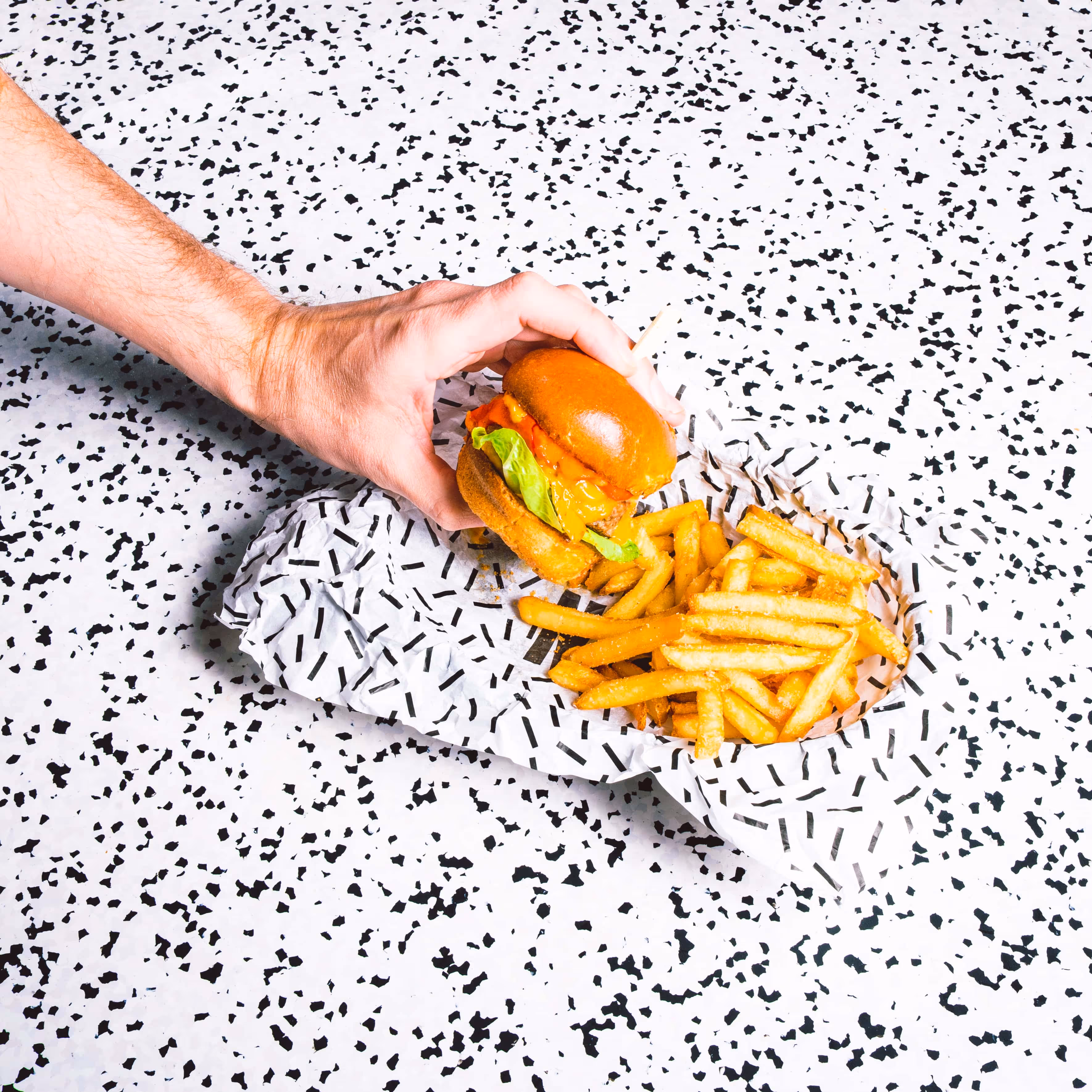 Hamburger and fries served at the PINPIN restaurant