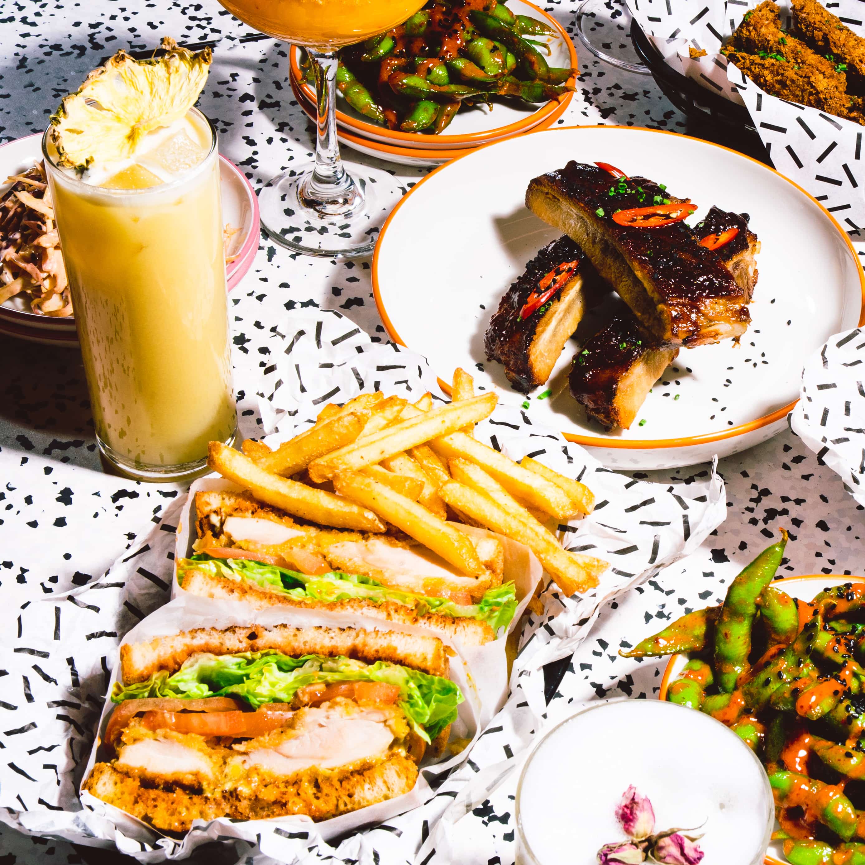 A picture of a big variety of foods served at the PINPIN restaurant