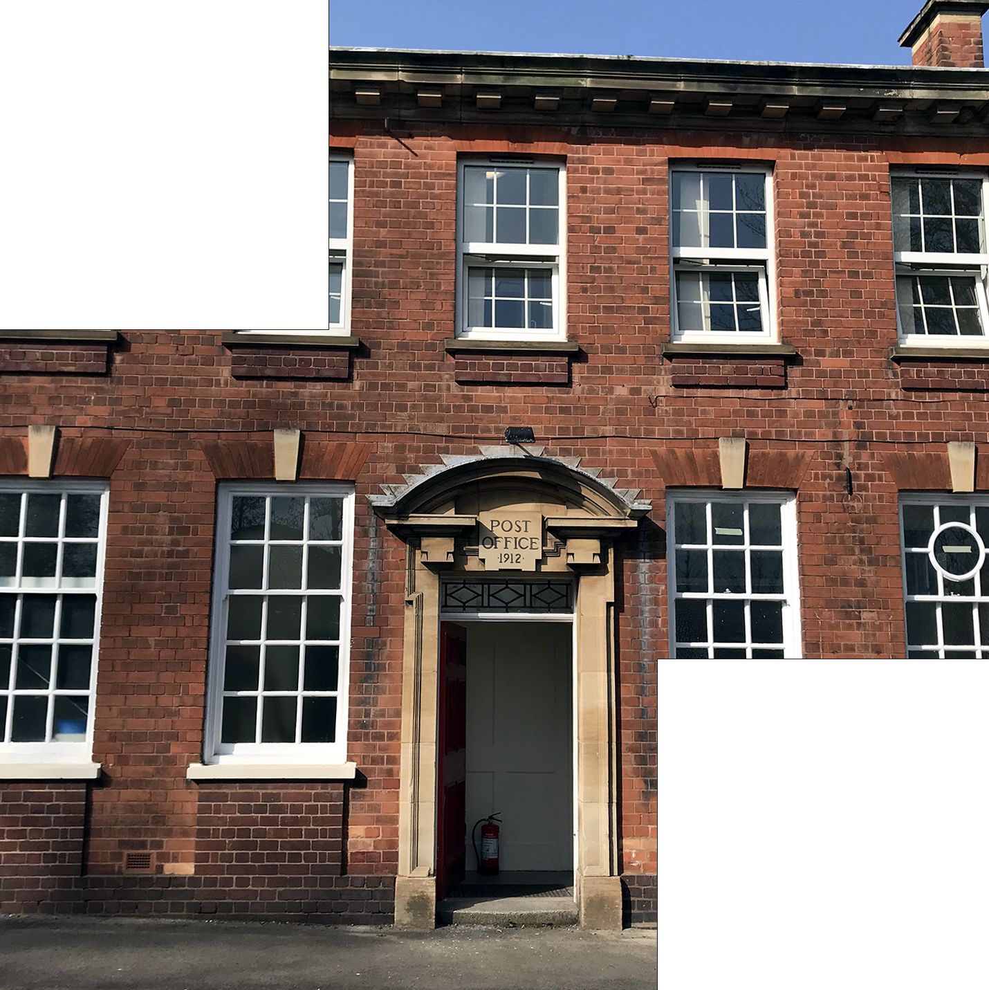 A war medal in the shape of a cross with a lion, crown and an encryption reading for valor