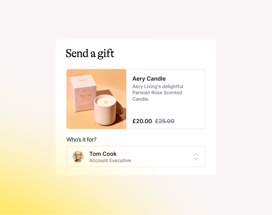 Gift selection interface showing 'Send a gift' with an Aery Candle product featuring a Parisian Rose Scented Candle priced at £20.00, discounted from £25.00, and a recipient selector displaying 'Tom Cook, Account Executive' with a small profile photo.