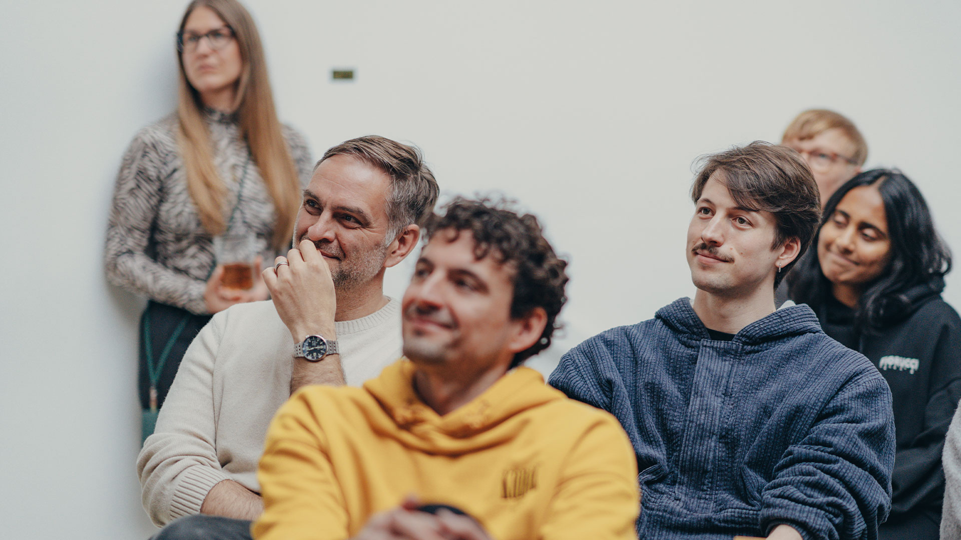 Pablo Bernal, Andreas diefenbach watching Leonardo B. Foureaux give a talk at phoenix design