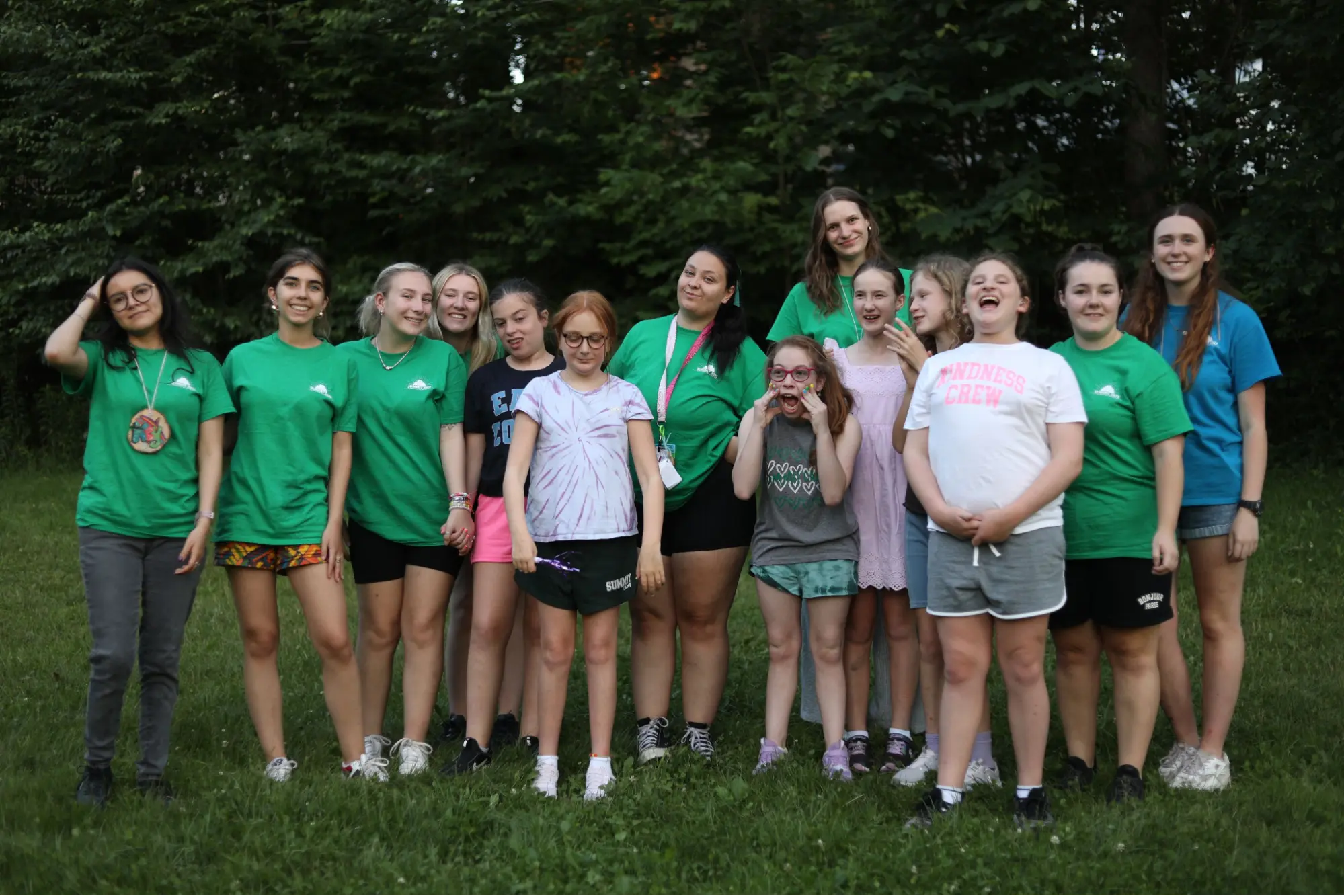 A group of campers and counsellors at Summit Camp and Travel posing for a photo outdoors