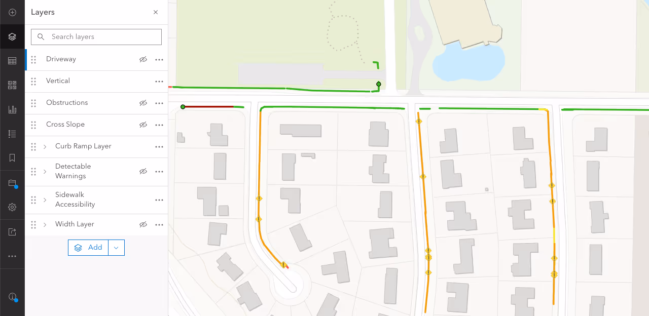Vertical displacements in the sidewalk network are marked by yellow caution signs