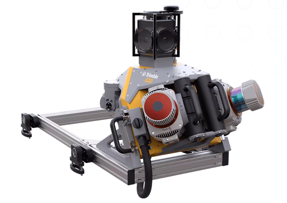Trimble MX9 mobile mapping system device with multiple sensors including cameras and laser scanner mounted on a metal frame.