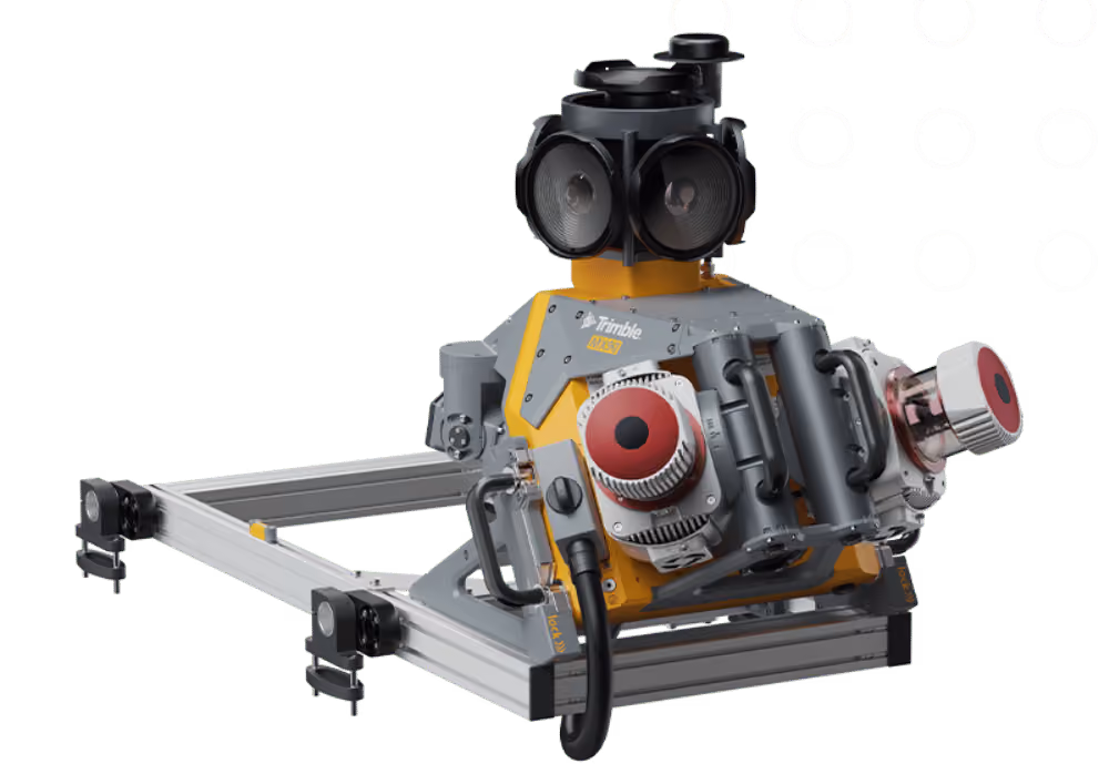 Trimble MX9 3D laser scanning system for precise surveying, mounted on a metal frame with multiple lenses and sensors.