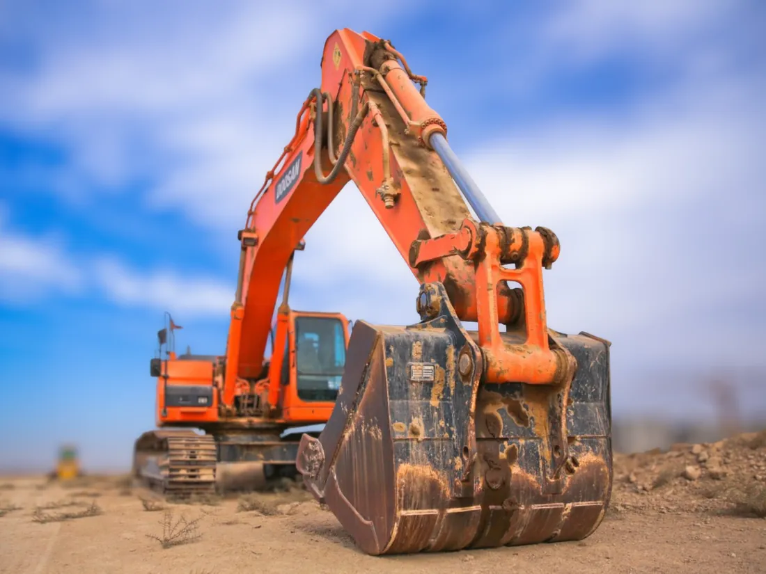 Excavator on a construction site – GAC controls for heavy equipment