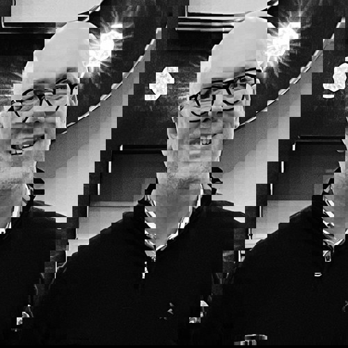 A profile photo of Simon Chapman, VP of Partner Enablement at Optimizely