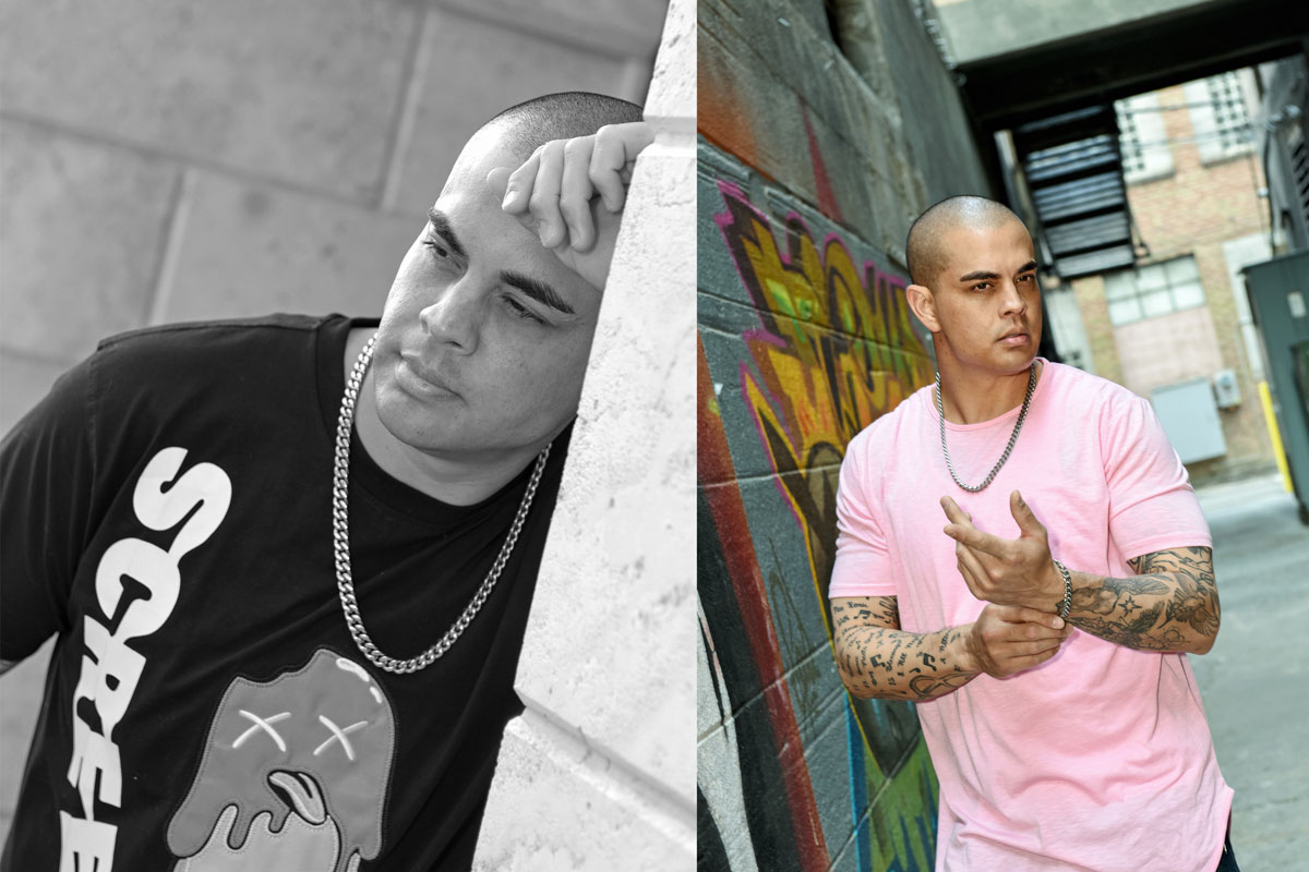 Man with shaved head wearing chain necklace; left image in black shirt leaning on wall in black and white, right image in pink shirt standing in graffiti-covered alley.