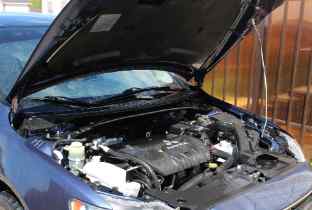 front of a car with the hood up
