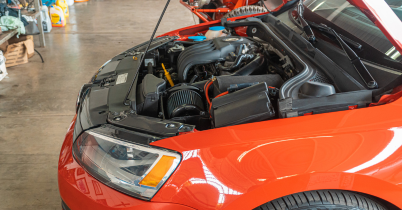 Car dashboard with battery, oil, and check engine warning lights
