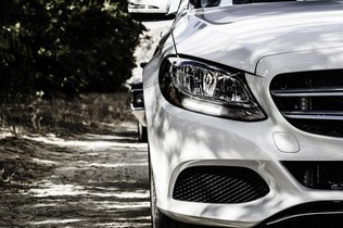 view of a white mercedes from the front