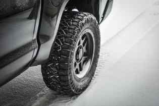 diagonal side view of a car's tire